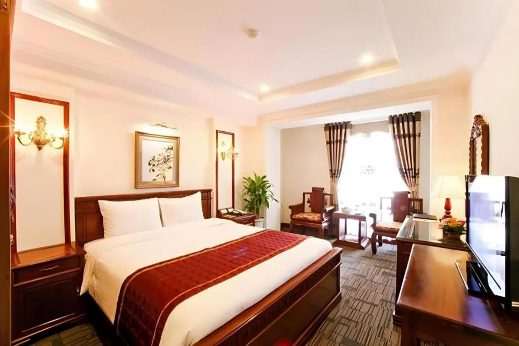 Bed in Eden Hotel Hanoi