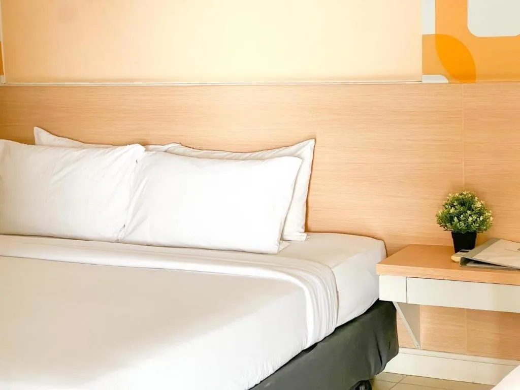 Bed in Nana Chat Bangsaen Hotel