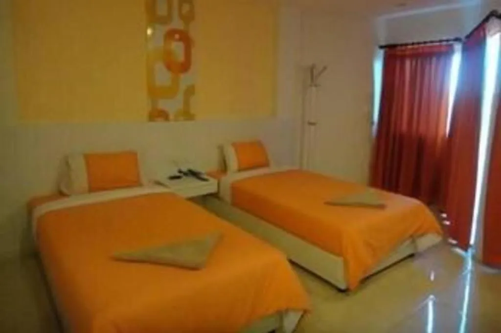 Bed in Nana Chat Bangsaen Hotel