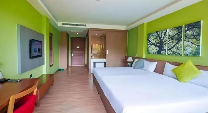 Bed in River Kwai Village Hotel