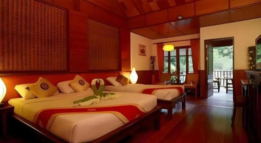 Bed in River Kwai Village Hotel