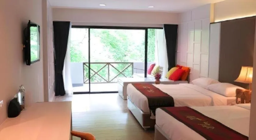 Bed in River Kwai Village Hotel