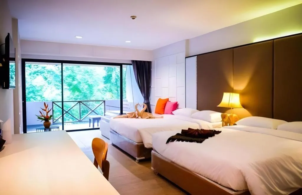 Bed in River Kwai Village Hotel