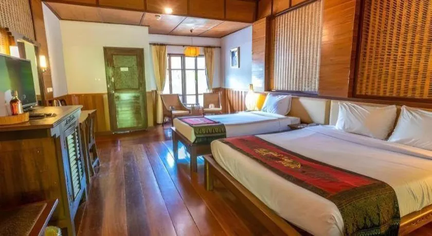 Bed in River Kwai Village Hotel
