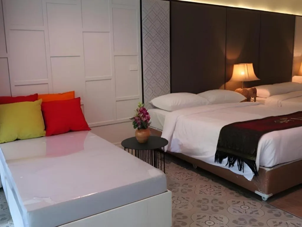 Bed in River Kwai Village Hotel