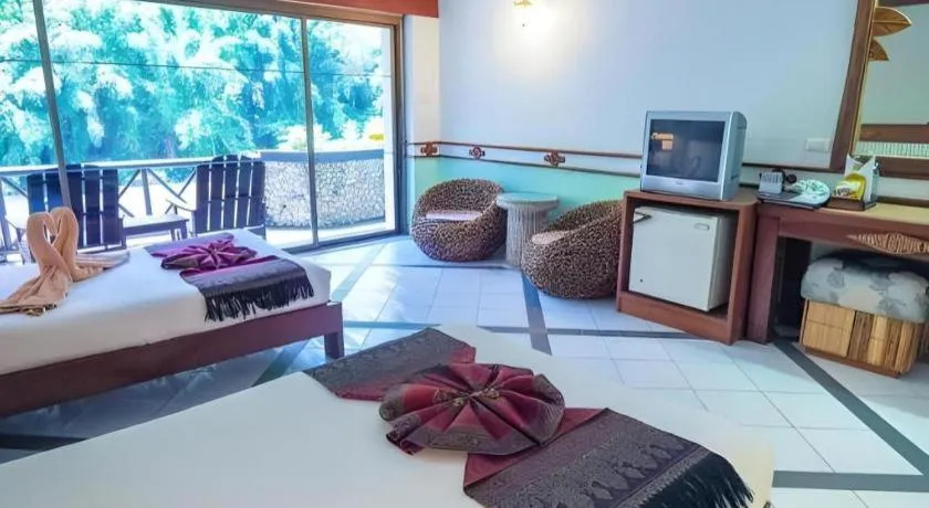 Bed in River Kwai Village Hotel