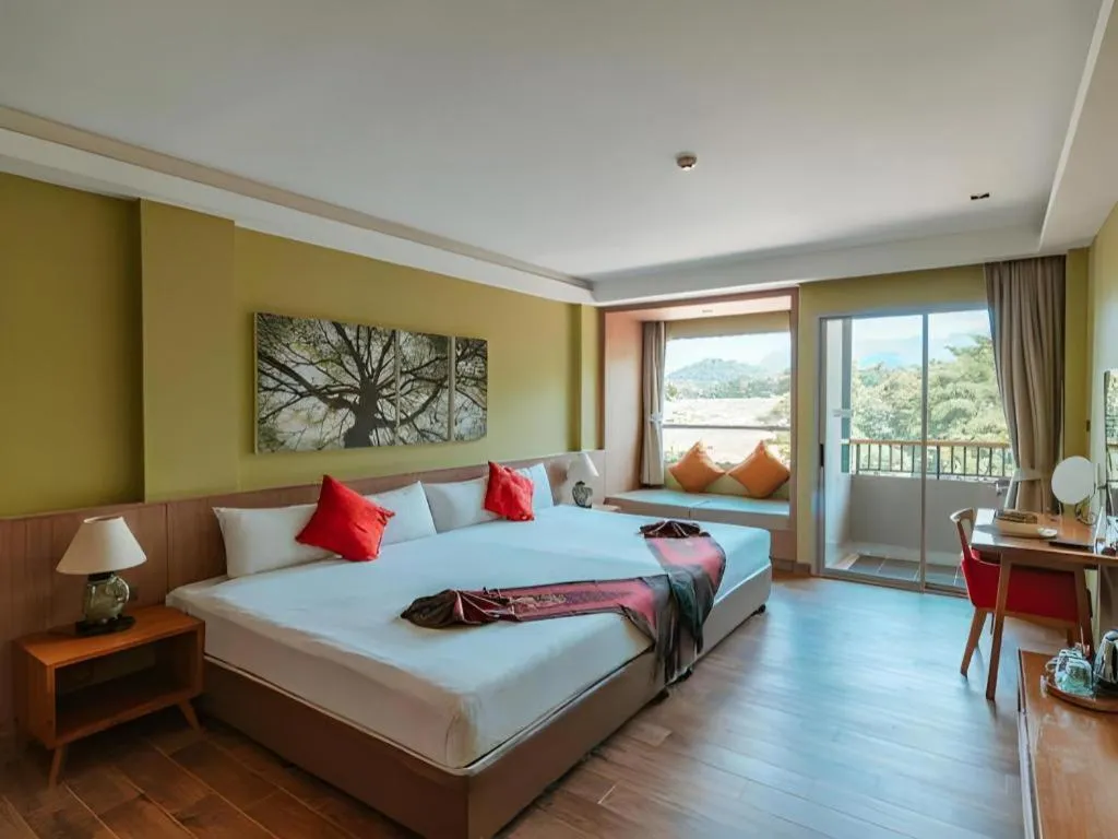 Bed in River Kwai Village Hotel