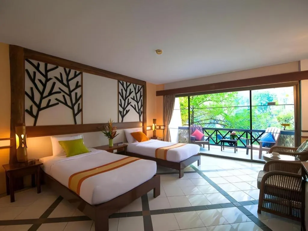 Bed in River Kwai Village Hotel