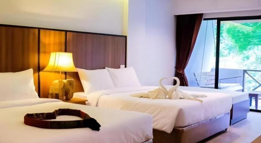 Bed in River Kwai Village Hotel