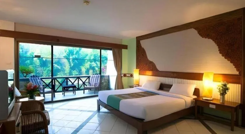 Bed in River Kwai Village Hotel