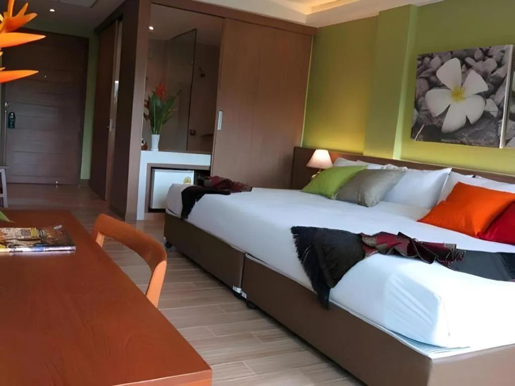 Bed in River Kwai Village Hotel