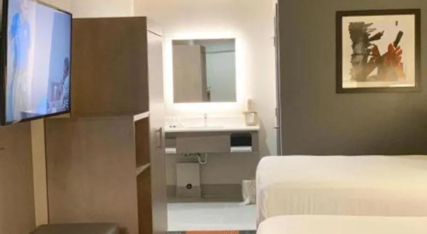 Bed in Pacific Motor Inn