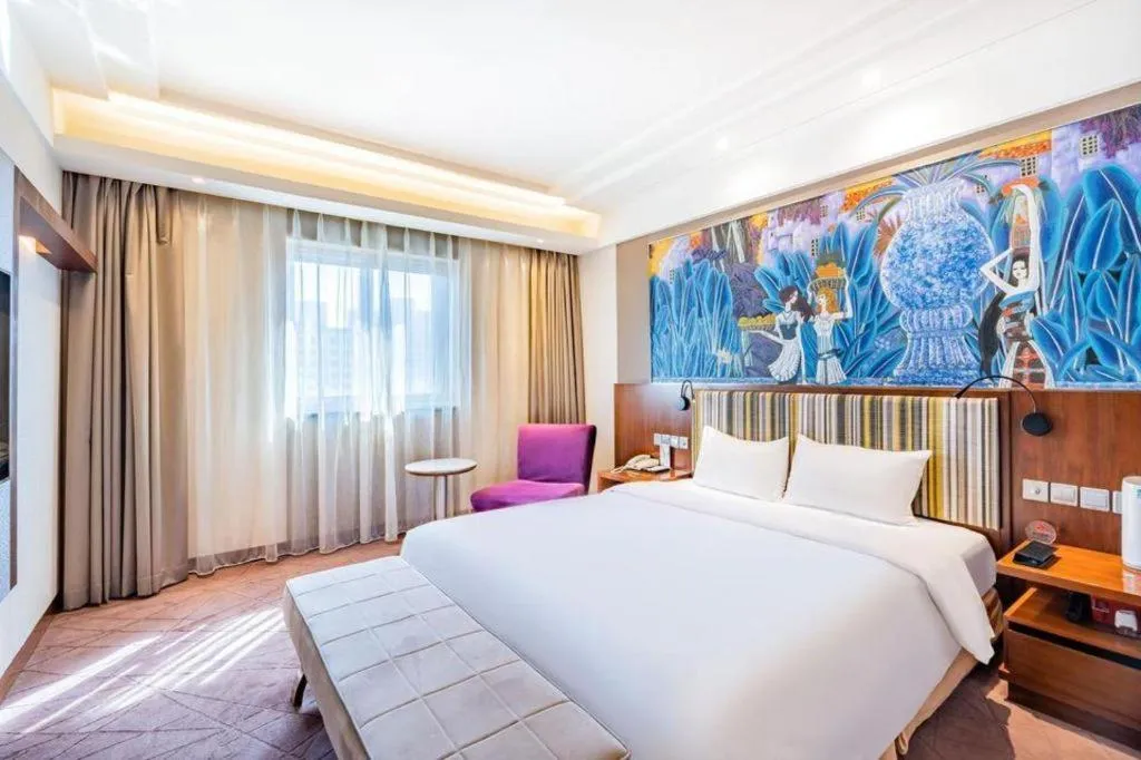 Bed in Grand Skylight Catic Hotel