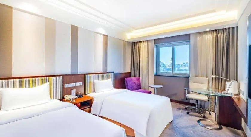 Bed in Grand Skylight Catic Hotel