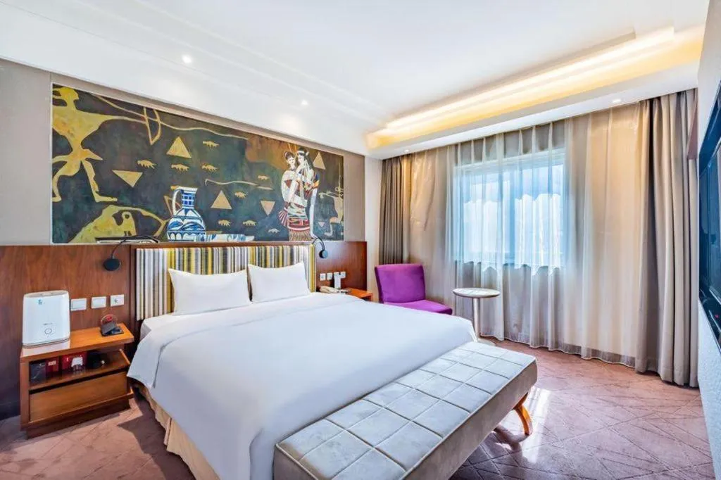 Bed in Grand Skylight Catic Hotel