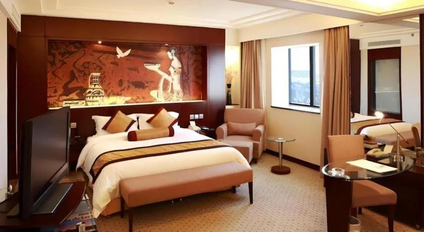 Bed in Grand Skylight Catic Hotel