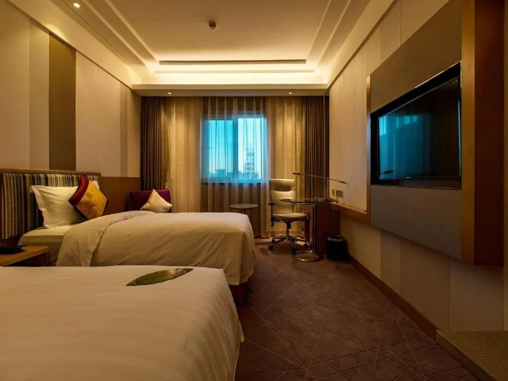 Bed in Grand Skylight Catic Hotel