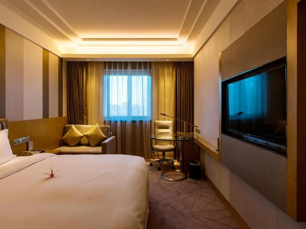 Bed in Grand Skylight Catic Hotel