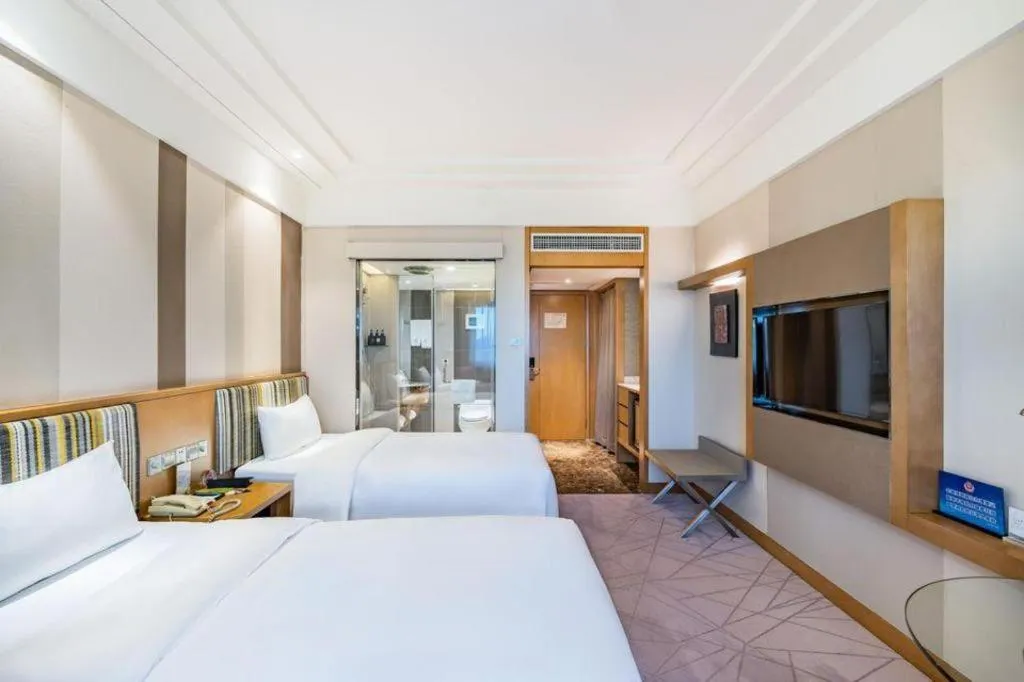 Bed in Grand Skylight Catic Hotel