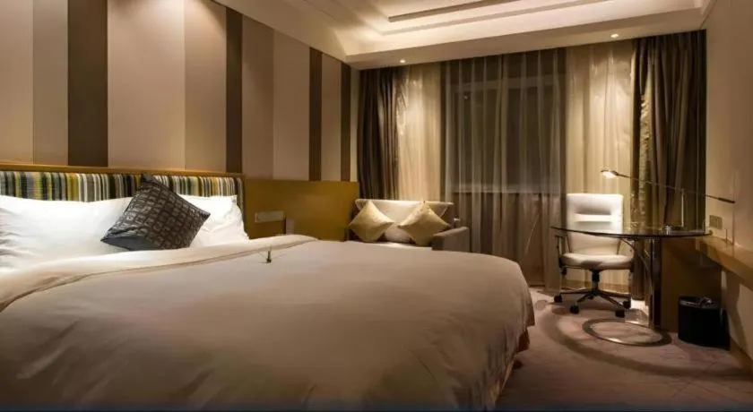 Bed in Grand Skylight Catic Hotel