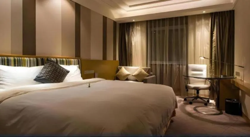 Bed in Grand Skylight Catic Hotel