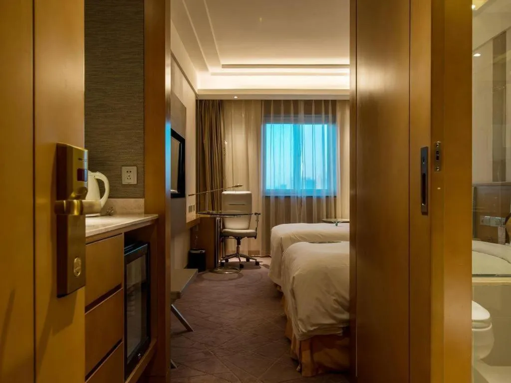 Bed in Grand Skylight Catic Hotel