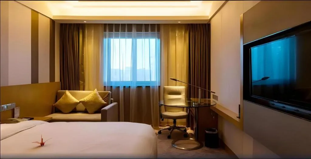 Bed in Grand Skylight Catic Hotel