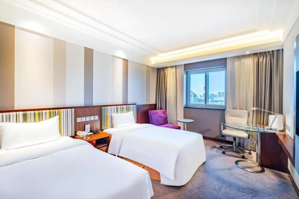 Bed in Grand Skylight Catic Hotel