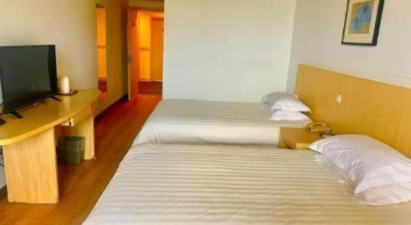 Bed in Jinjiang Inn Jiaxing South Lake