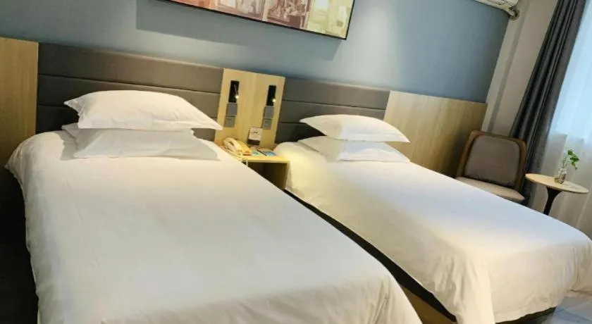 Bed in Jinjiang Inn Jiaxing South Lake
