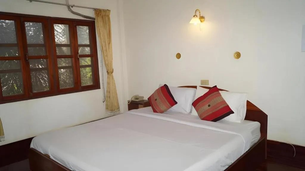 Bed in Champa Residence Hotel