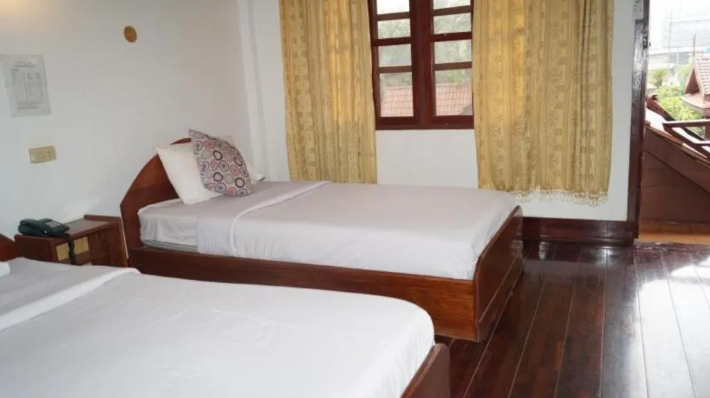 Bed in Champa Residence Hotel