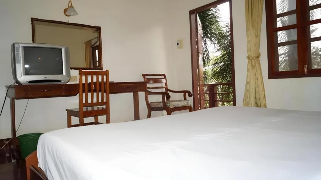 Bed in Champa Residence Hotel