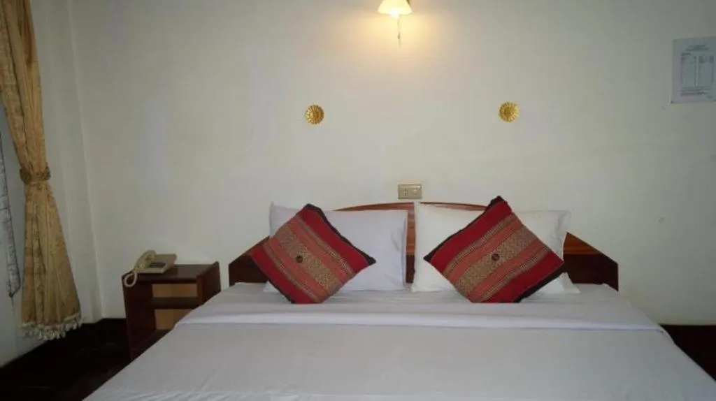 Bed in Champa Residence Hotel