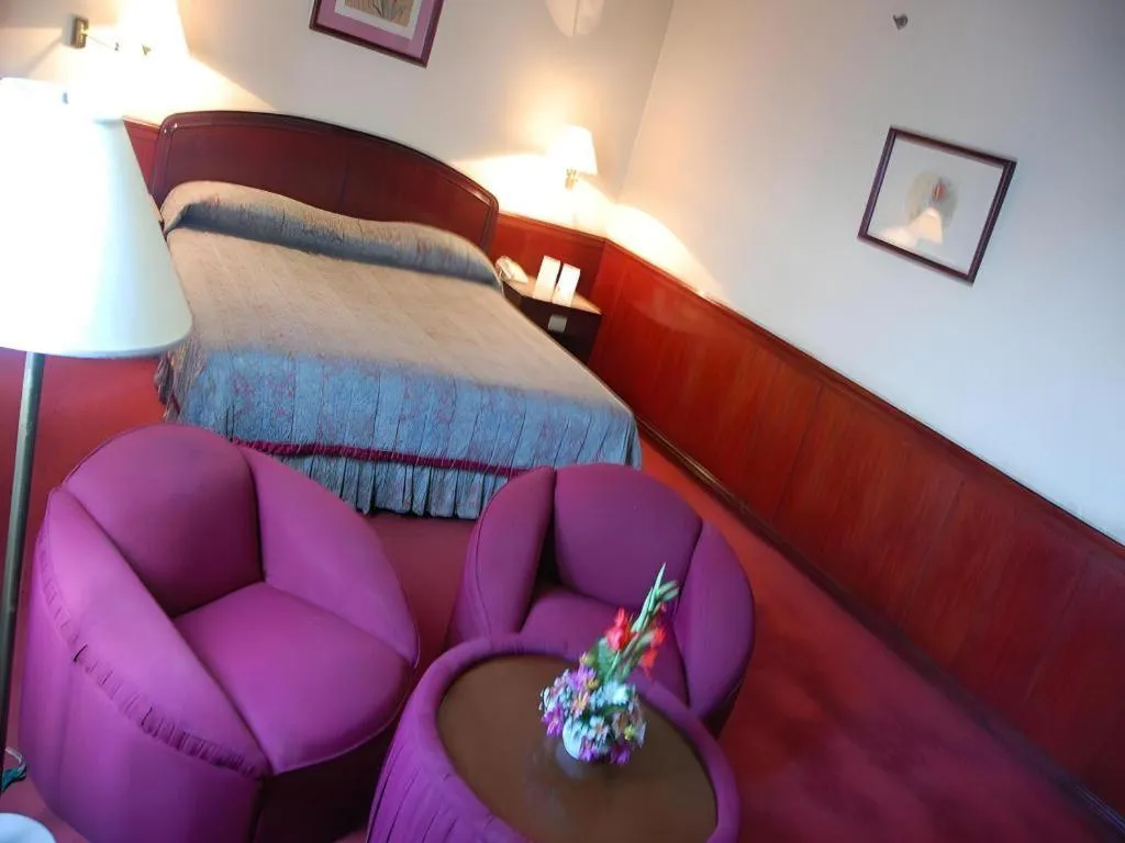 Bed in Great Eastern Hotel Quezon City