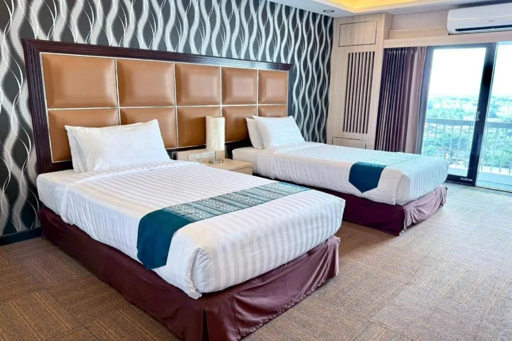 Bed in Pailyn Phitsanulok Hotel