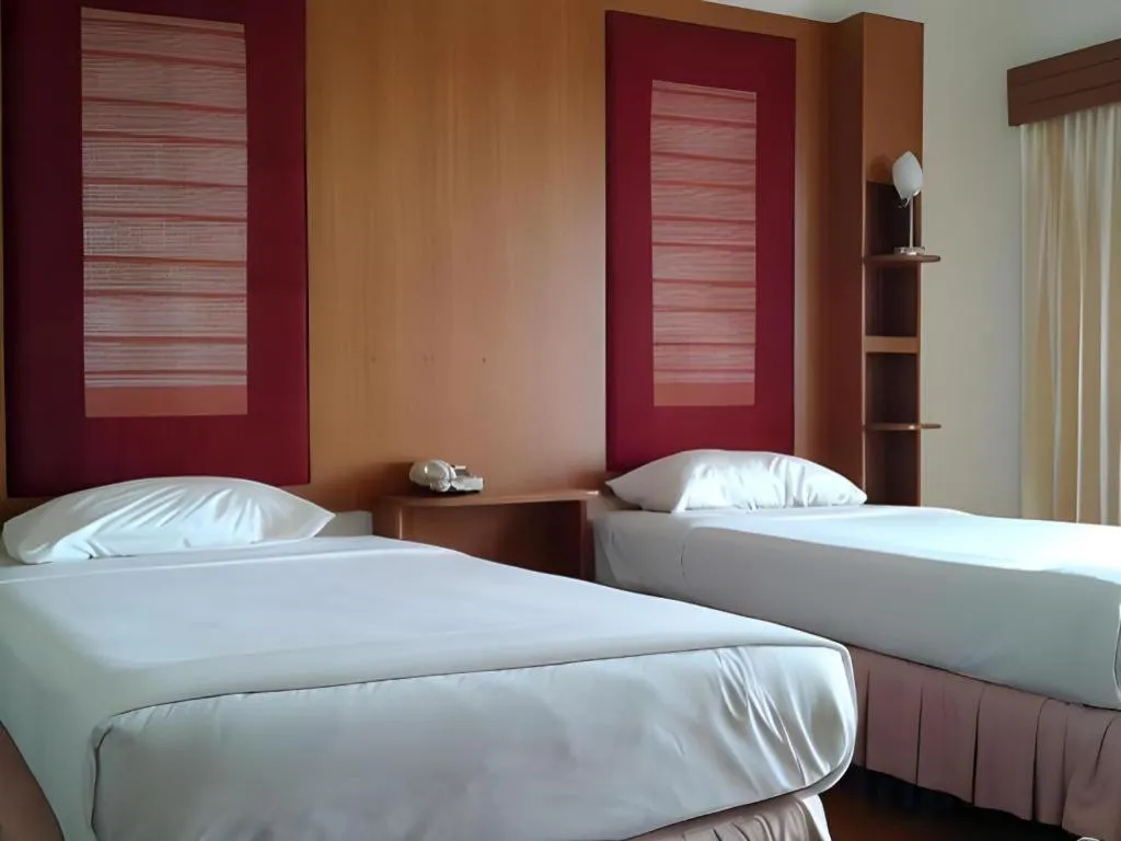 Bed in Pailyn Phitsanulok Hotel