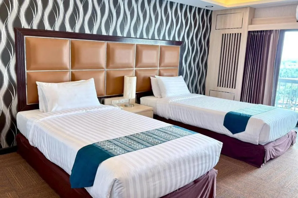 Bed in Pailyn Phitsanulok Hotel