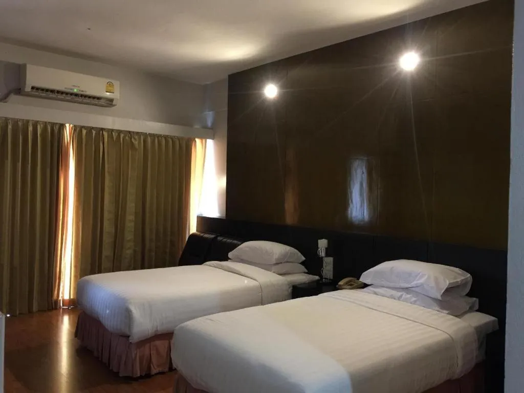 Bed in Pailyn Phitsanulok Hotel