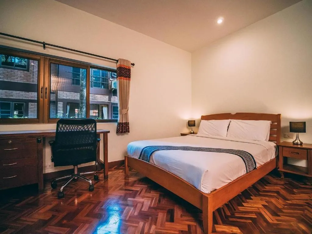 Bed in Tao Garden Health Spa & Resort