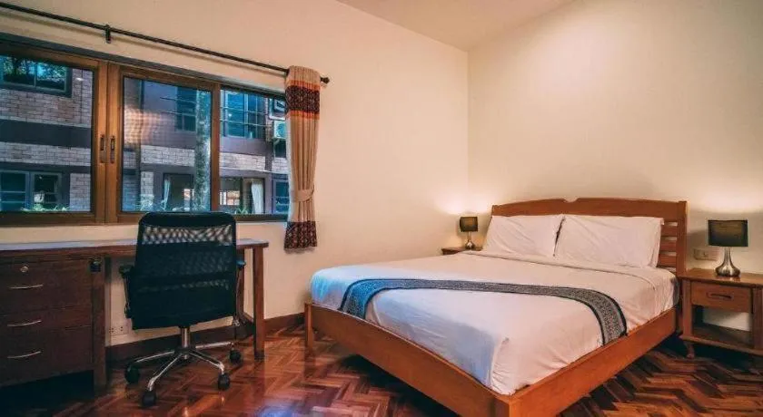 Bed in Tao Garden Health Spa & Resort