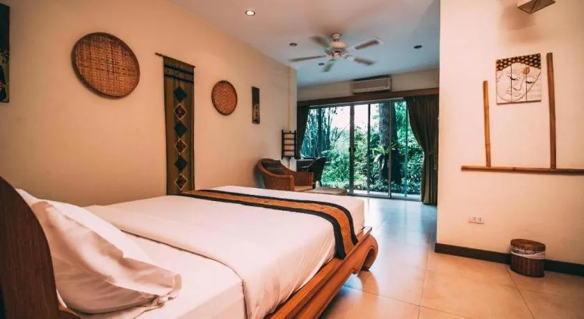 Bed in Tao Garden Health Spa & Resort