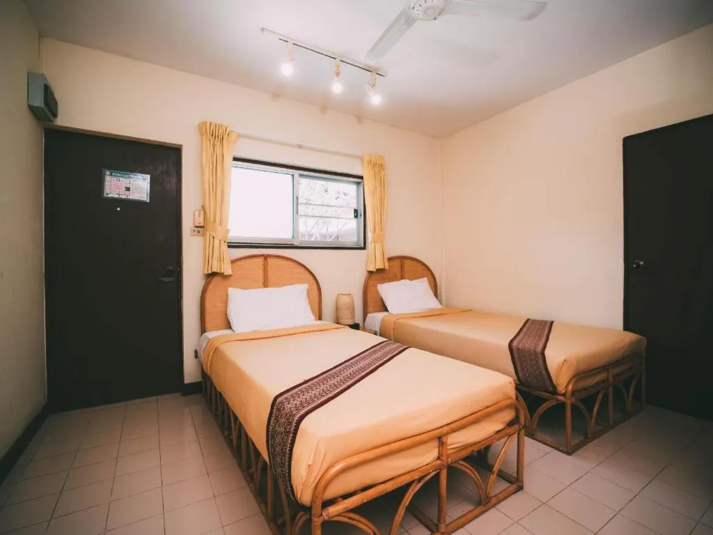 Bed in Tao Garden Health Spa & Resort