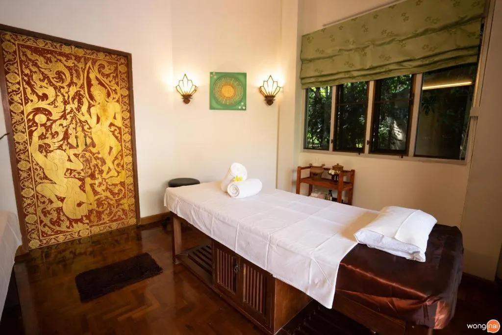 Bed in Tao Garden Health Spa & Resort