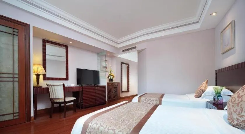 Bed in Sanya Baohong Hotel