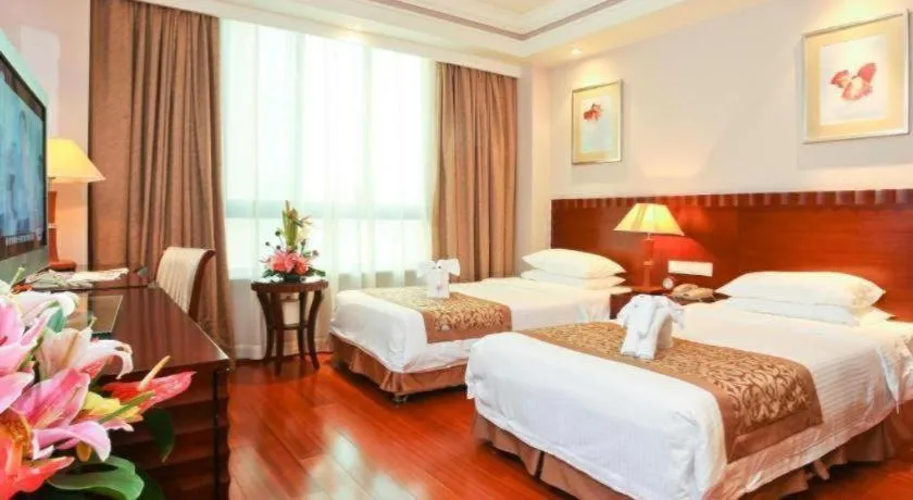 Bed in Sanya Baohong Hotel