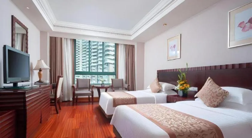 Bed in Sanya Baohong Hotel