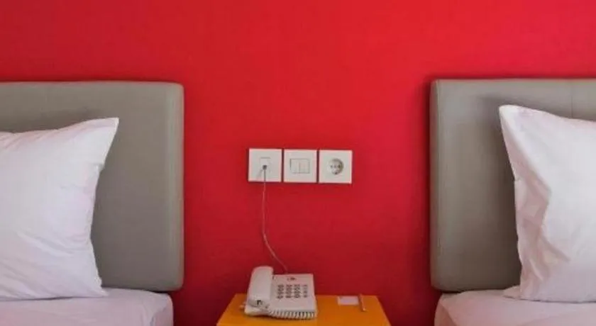 Bed in Amaris Hotel Ambon