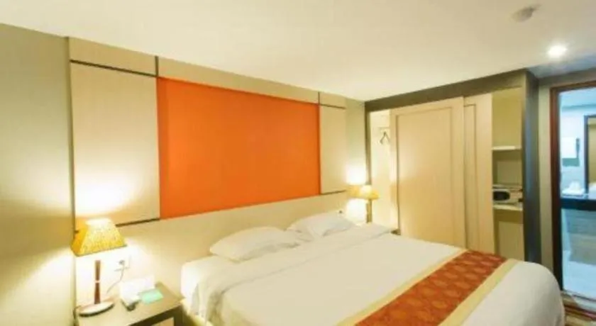 Bed in Hermes Palace Hotel Medan