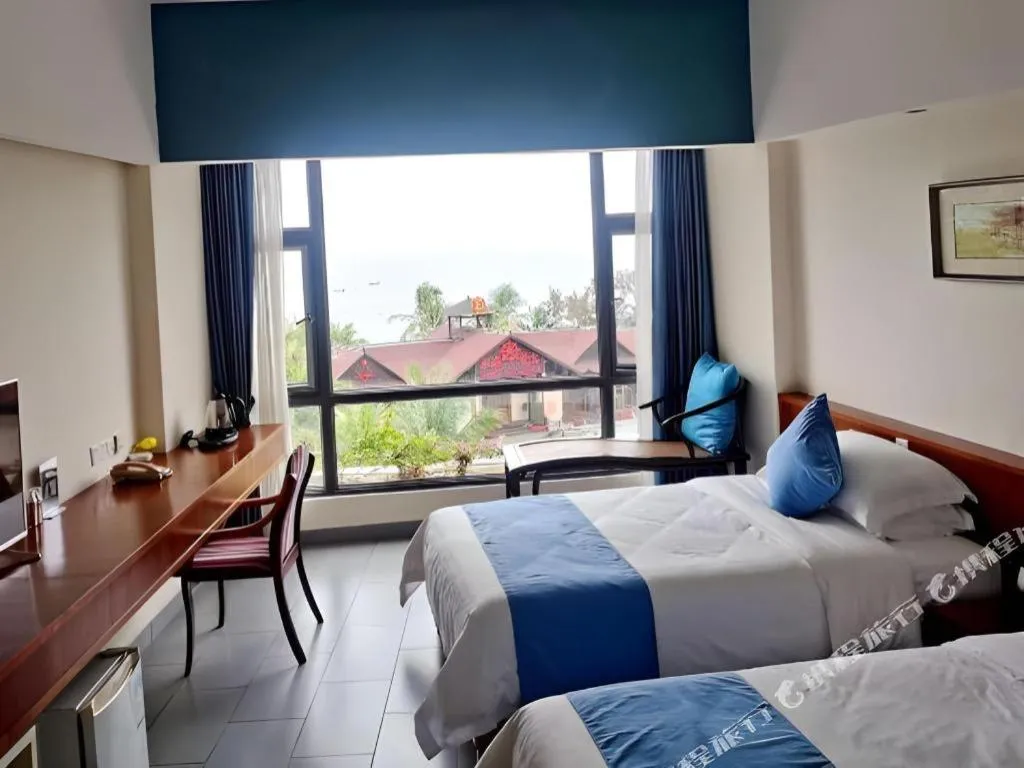 Bed in Sanya Luyi Sea View Hotel